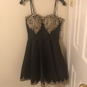 Black and gold prom dress